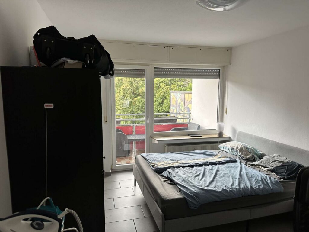 Schlafzimmer mit Balkon